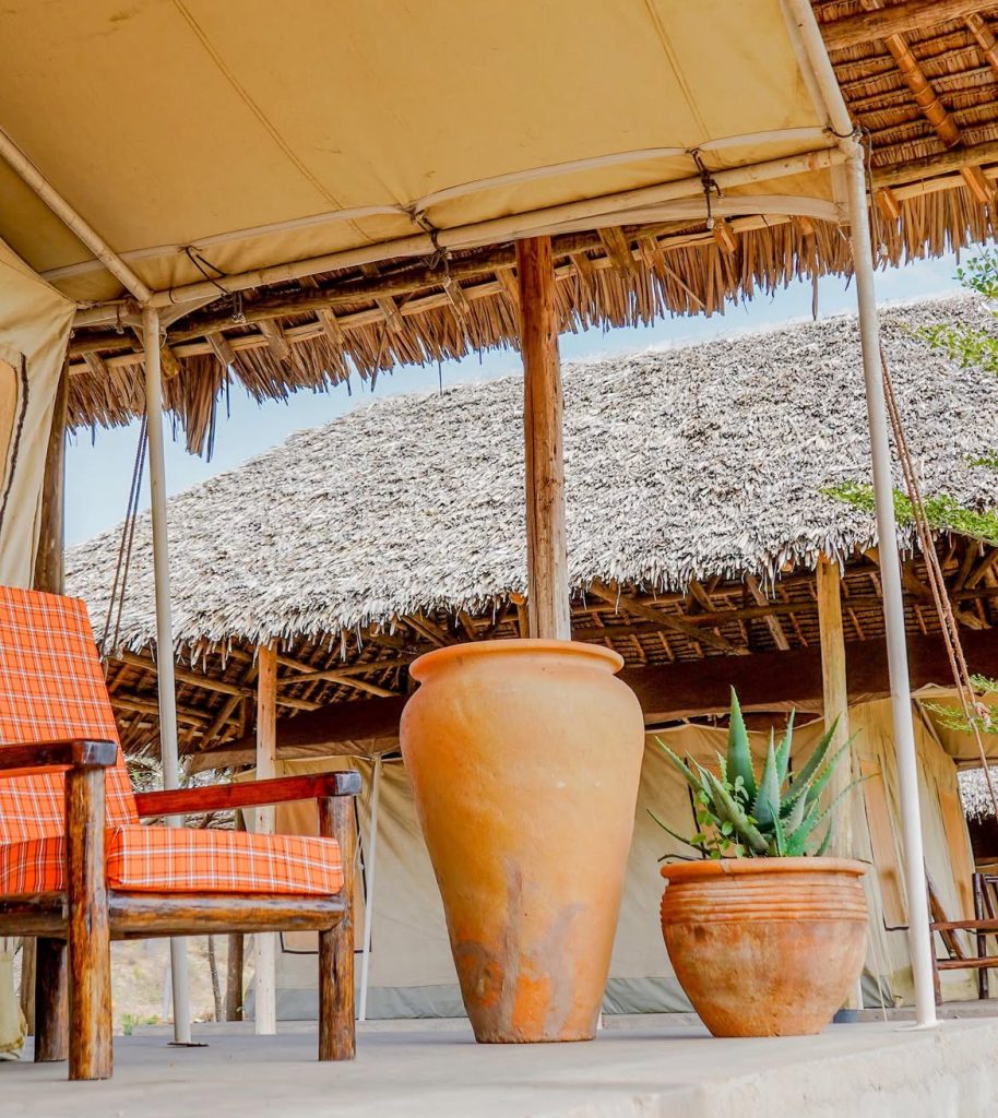 Image of a seat outside a sleeping section at Kwenia